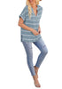 Full view of model wearing light blue split V-neckline batwing sleeves striped loose top