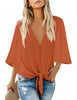 Front view of model wearing Rust V-Neckline Button-Up Tie-Front Top