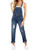 Front view of model wearing dark blue cuffed hem ripped bib denim overall jumpsuit