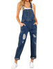 Model poses wearing dark blue cuffed hem ripped bib denim overall jumpsuit