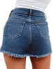 Back view of model wearing deep blue high-waist frayed raw hem ripped denim shorts