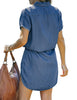 Back view of model wearing blue elastic waist curved hem button down denim shirt dress
