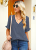 Front view of model wearing steel blue ruffle trim short sleeves V-neck button-down top