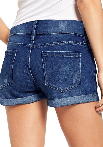 Back view of model wearing blue roll-over hem double button distressed denim shorts