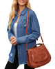 Pretty model wearing blue frayed hem distressed button-down denim jacket