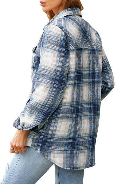 Angled back shot of model wearing navy plaid long sleeves button down jacket