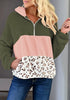 Front view of model wearing army green colorblock half-zip hooded fleece pullover