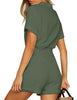 Back view of model wearing army green short sleeves button-down belted romper