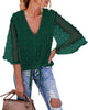 Model wearing dark green 3/4 sleeves pompom tie-front top