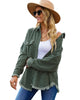 Front view of model wearing dark green drop shoulders contrast corduroy button-down jacket