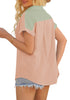 Side view of model wearing sage green short sleeves colorblock button-up top