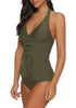 Angled shot of model wearing army green solid color halter tankini set