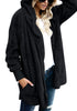 Angled shot of model wearing black snuggle fleece oversized hooded cardigan-min