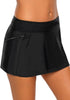 Angled shot of model wearing black zipper-pocket waistband skirted bikini bottom