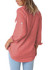 Back view of model wearing coral long cuffed sleeves lapel button-up blouse