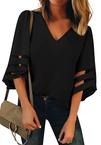 Front view of model wearing  black 3/4 bell mesh panel sleeves V-neckline loose top