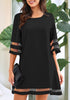 Front view of model wearing black 34 bell sleeves mesh panel crew-neckline loose dress