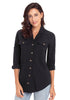 Front view of model wearing black long cuffed sleeves lapel button-up blouse