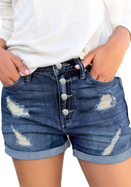 Front view of model wearing blue roll-over hem button-up ripped denim shorts