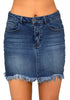 Front view of model wearing deep blue frayed hem washed denim mini skirt
