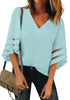 Front view of model wearing light blue 34 bell mesh panel sleeves V-neckline loose top