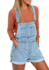 Front view of model wearing light blue rolled hem shorts denim bib overall