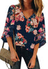 Front view of model wearing navy 34 bell mesh panel sleeves V-neckline floral top