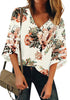 Front view of model wearing white 34 bell mesh panel sleeves V-neckline floral top