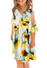 Front view of model wearing yellow cold-shoulder floral short sleeves girl tunic dress