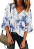 Front view of model wearing blue 3-4 bell mesh panel sleeves V-neck tie-dye top