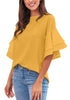 Front view of model wearing brown trumpet sleeves keyhole-back blouse