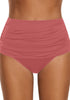 Front view of model wearing coral pink high waist ruched swim bottom