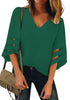 Front view of model wearing dark green 3-4 bell mesh panel sleeves V-neckline loose top