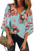 Front view of model wearing light blue 34 mesh panel sleeves V-neckline floral top