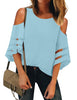 Front view of model wearing sky blue 3-4 bell mesh panel sleeves cold-shoulder loose top