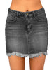 Front view of model wearing grey frayed hem washed denim mini skirt