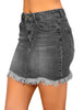 Side view of model wearing grey frayed hem washed denim mini skirt