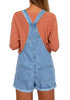 Back view of model wearing light blue floral embroidery rolled hem shorts bib overall
