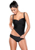 Model poses wearing black ruched tankini set