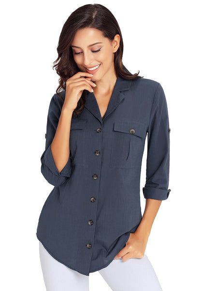 Model poses wearing navy blue long cuffed sleeves lapel button-up blouse