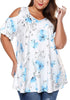 Model poses wearing plus size light blue floral cold-shoulder blouse