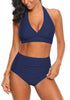 Model wearing navy halter ruched high-waist bikini set