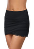 Side view of black tulip hem tassels mid-waist ruched swim skirt