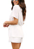 Side view of model wearing white short sleeves keyhole-back belted romper