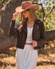 Dark Brown Women's Cropped Fringe Faux Suede Jacket — Trendy Zip Up Tassel Cowgirl Jacket with Full Lining & Faux Leather Finish