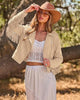 Beige Women's Cropped Fringe Faux Suede Jacket — Trendy Zip Up Tassel Cowgirl Jacket with Full Lining & Faux Leather Finish