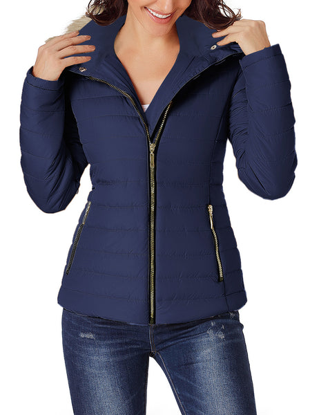 Front view of model wearing navy blue faux fur hooded zip up quilted jacket