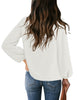 Back view of model wearing white V-neckline bishop sleeves loose fit women's top