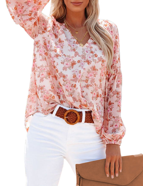 Front view of model wearing white long sleeves V-neckline floral-print boho blouse