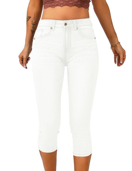 Front view of model wearing white below knee skinny fit denim jeans shorts